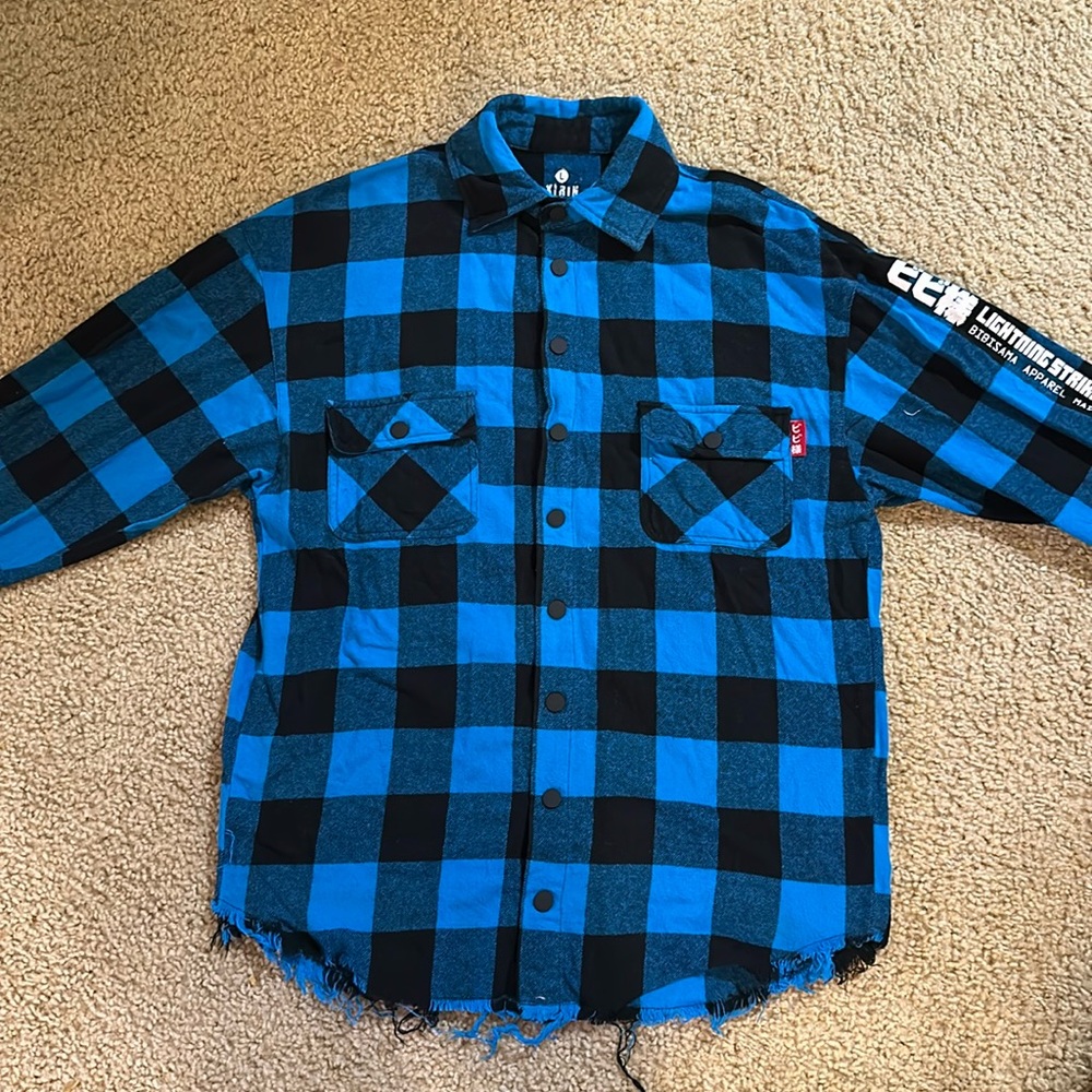 Flannel with dragon prints on back